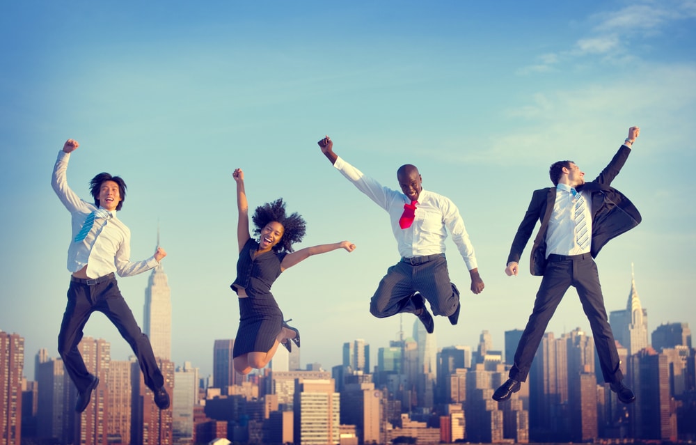 Group of business people jumping