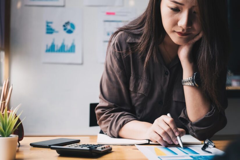 woman deciding is investing better than saving